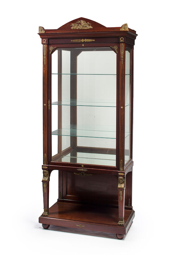 Bonhams : An Empire style gilt bronze mounted mahogany vitrine cabinet