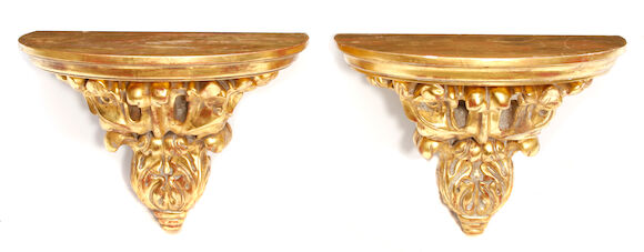 Bonhams : A pair of Italian Rococo style giltwood wall brackets