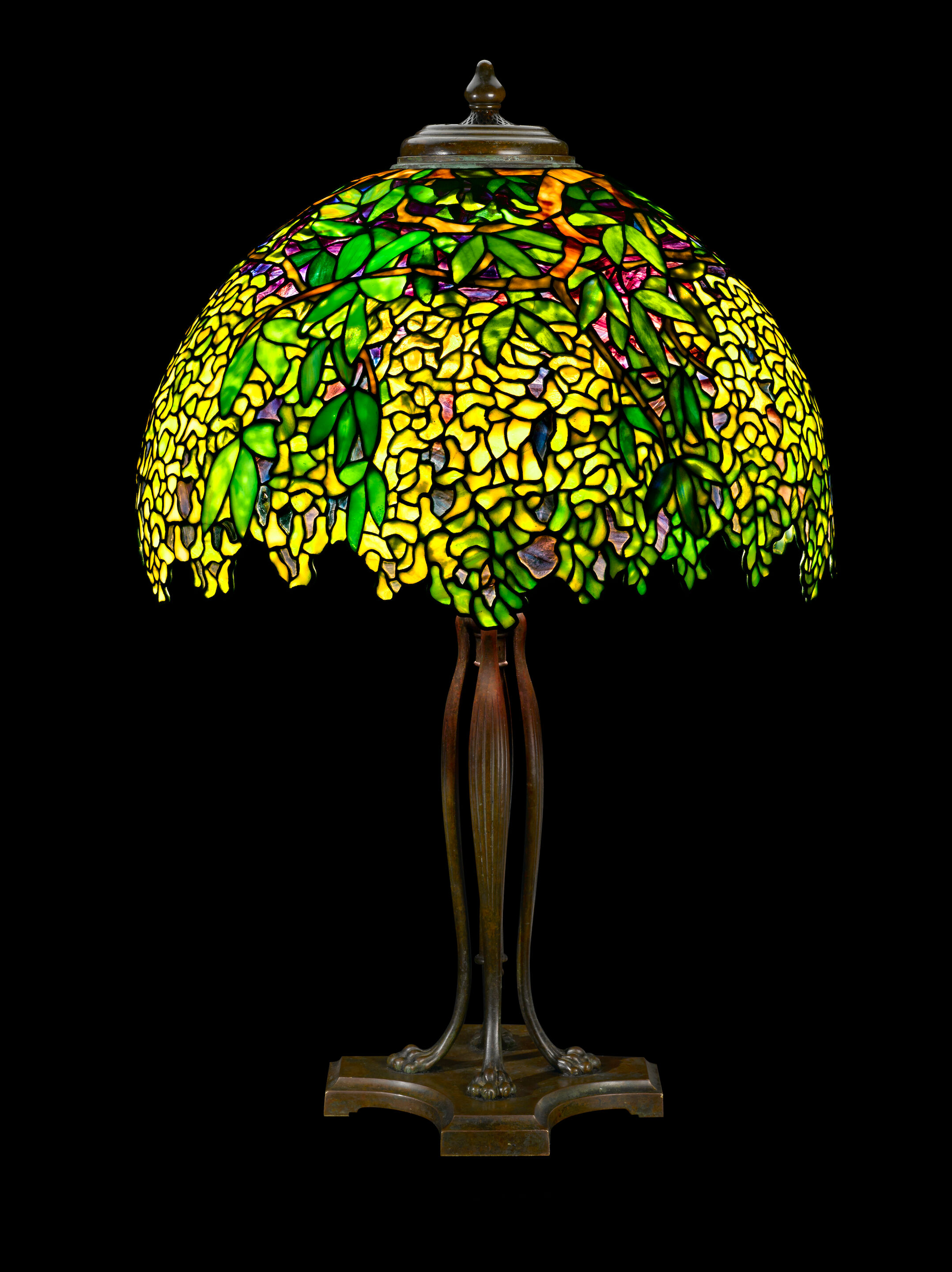 A Tiffany Studios Favrile glass and patinated bronze Laburnum ta