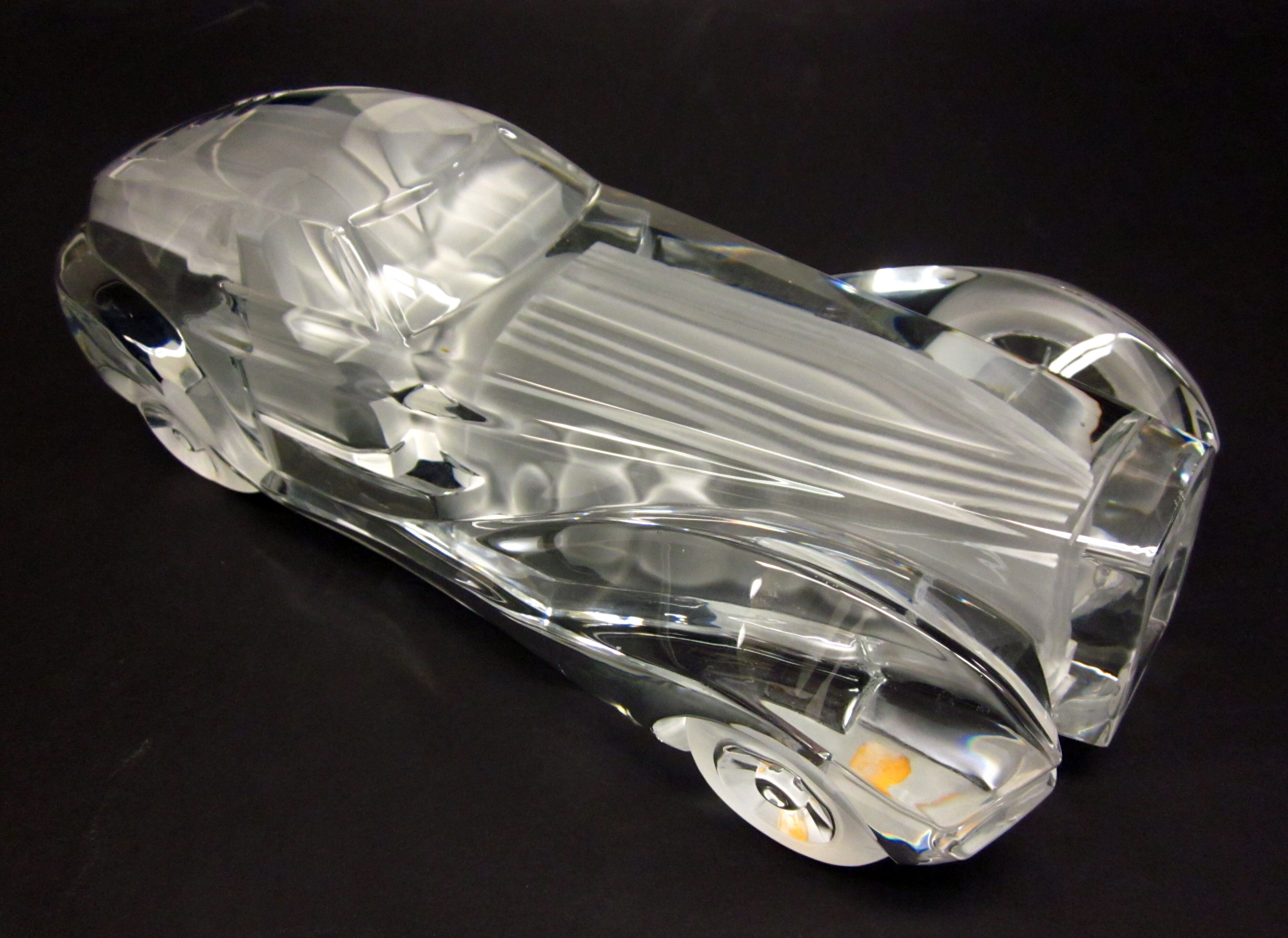 Bonhams A crystal automobile sculpture by Daum, France,