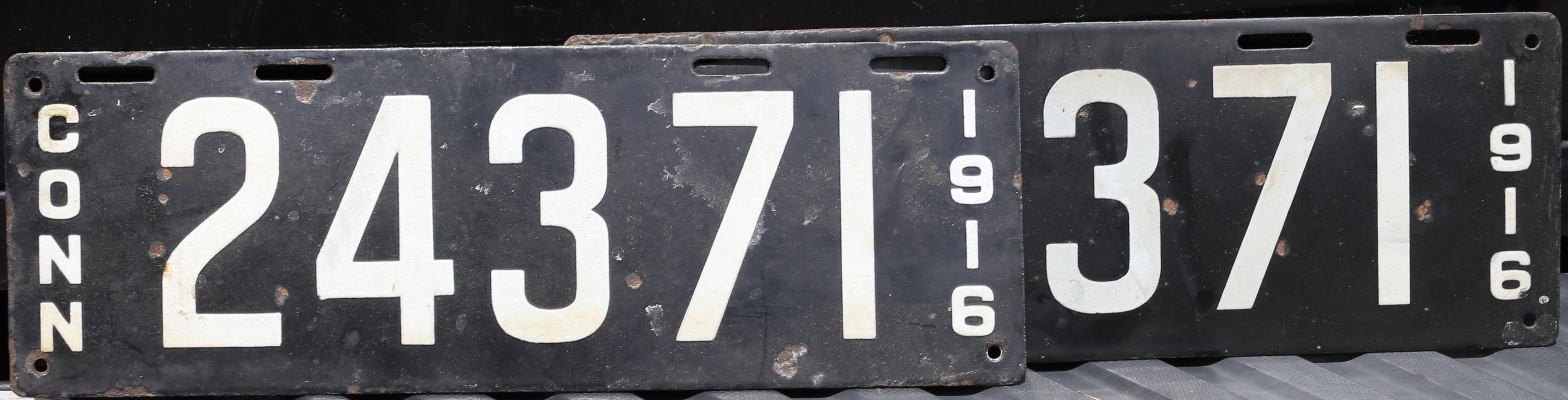 Bonhams Cars : Two pairs of antique license plates,