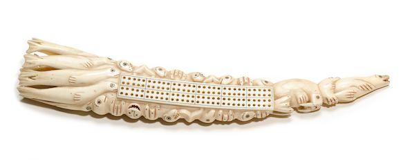 Bonhams : An Eskimo walrus ivory cribbage board