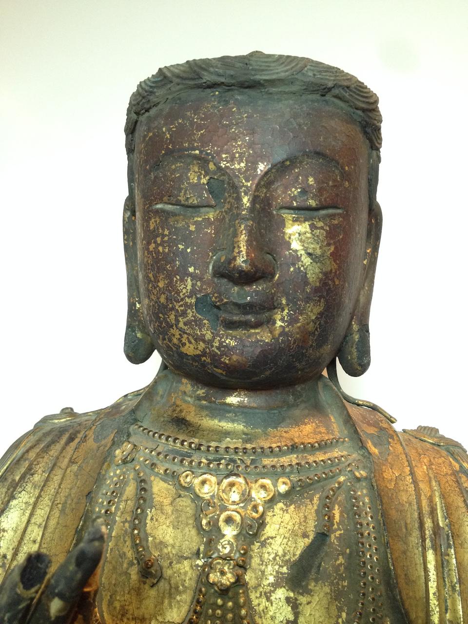 Bonhams : A gilt and lacquered wood figure of seated Guanyin Ming dynasty