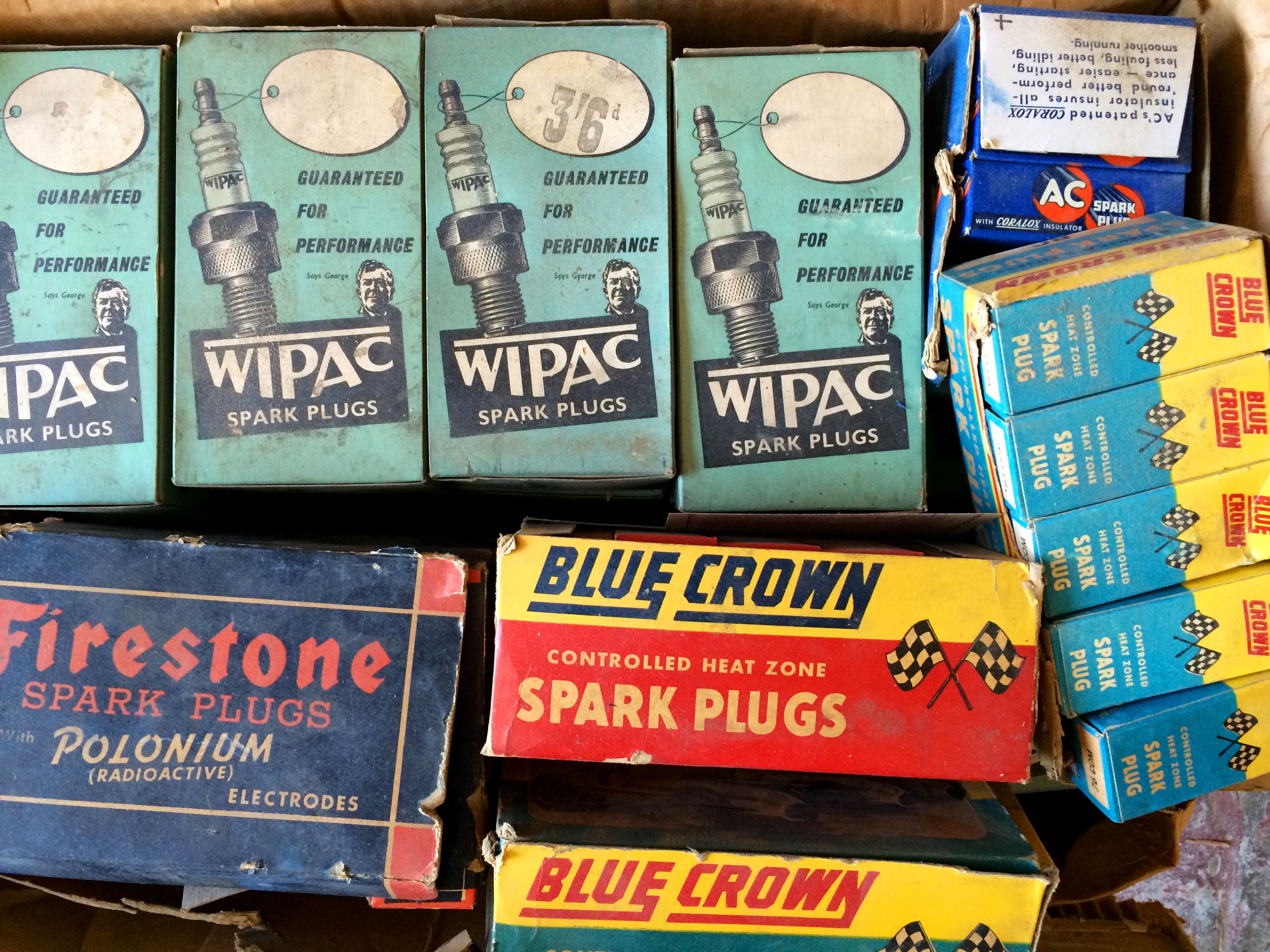 Bonhams Cars : A large box of vintage spark plugs including Wipac and ...