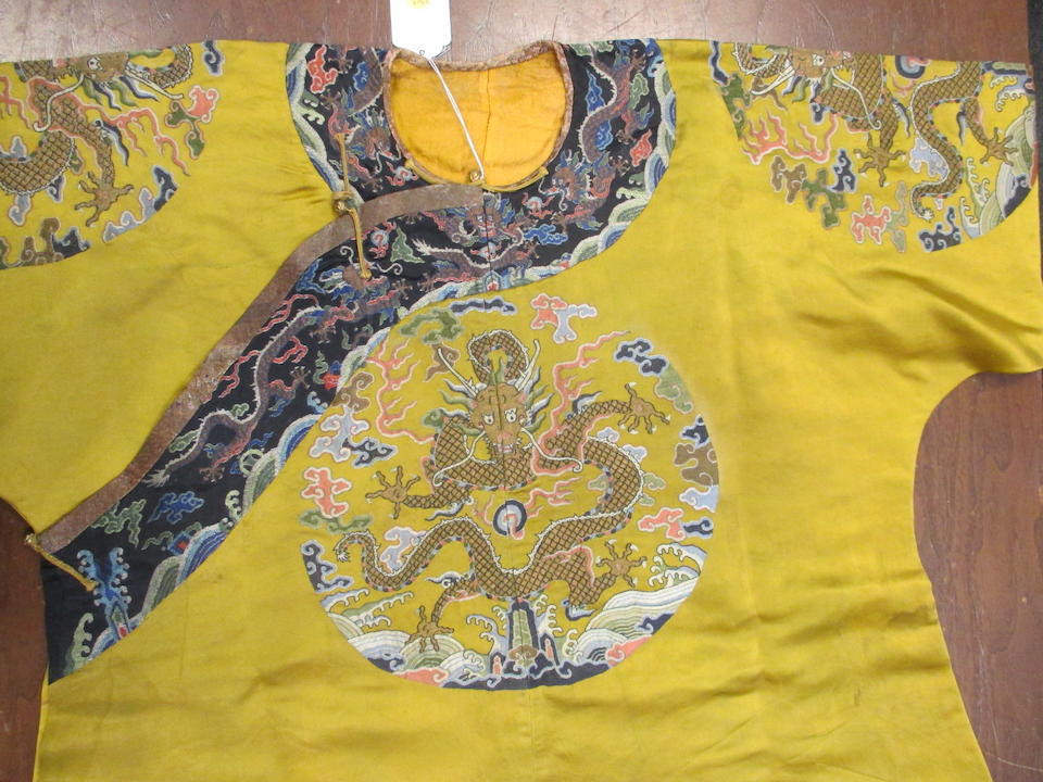 Bonhams : A yellow ground silk brocade dragon robe 18th/19th century