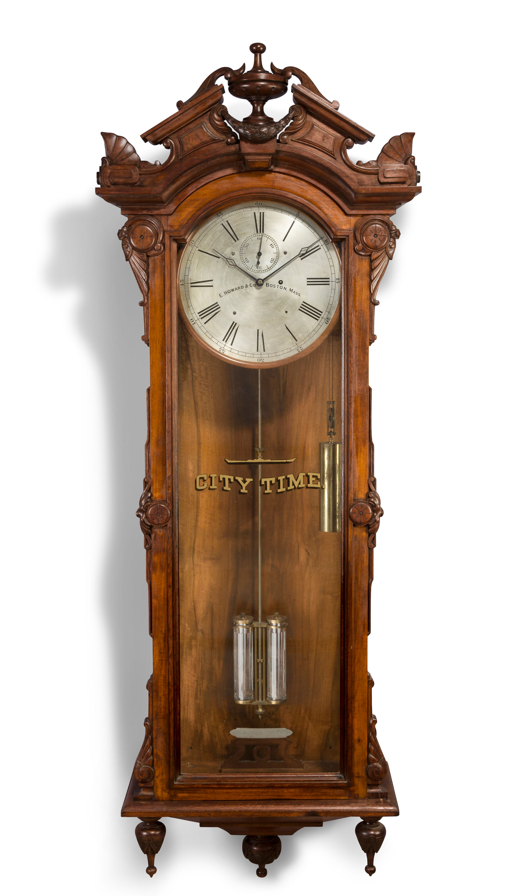 A rare glazed and carved walnut wall regulator E. Howard & Co.,