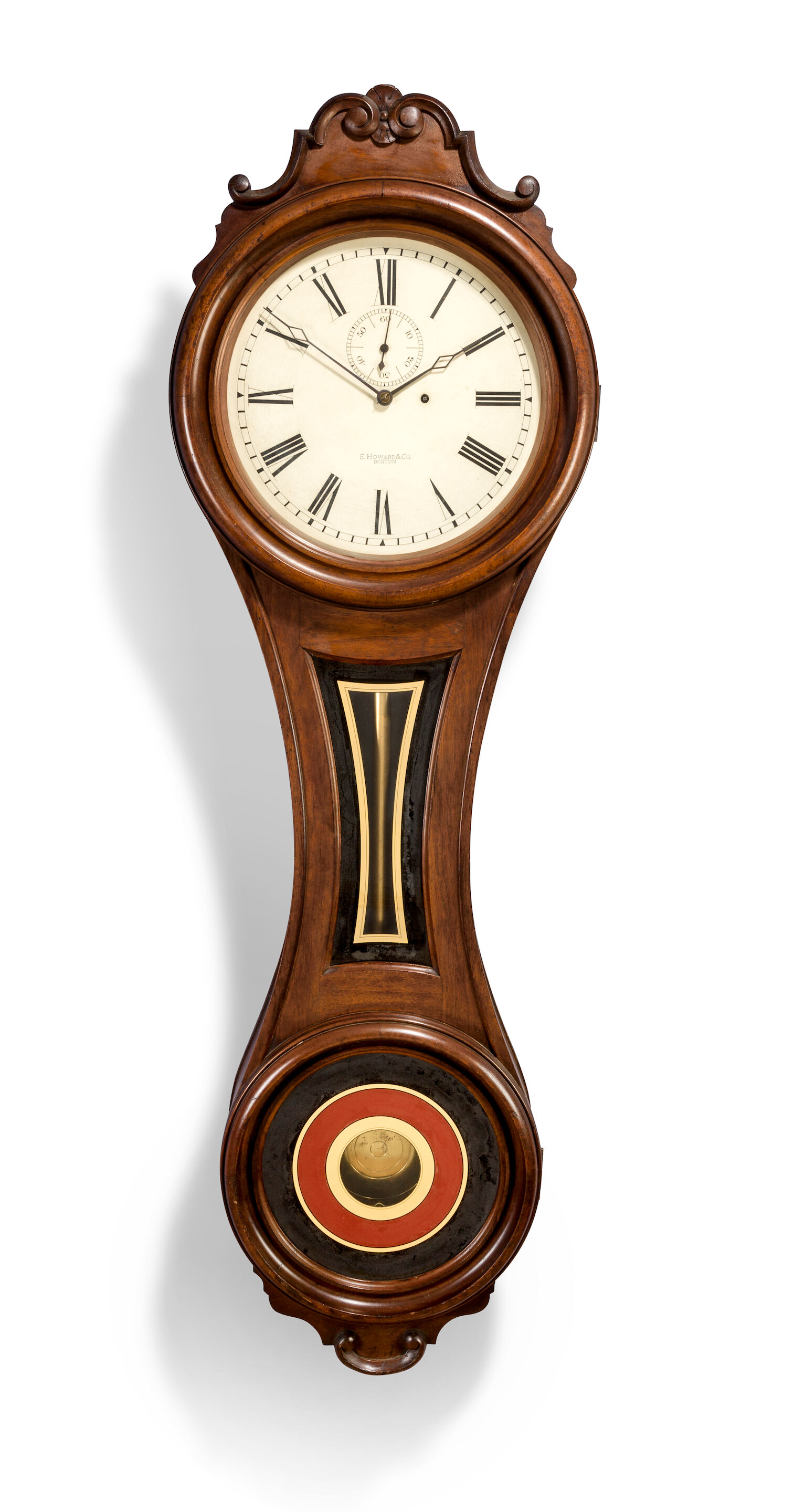 A fine and rare eglomisé paneled turned walnut "Figure Eight" wa