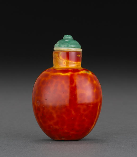 Bonhams : A simulated realgar glass snuff bottle