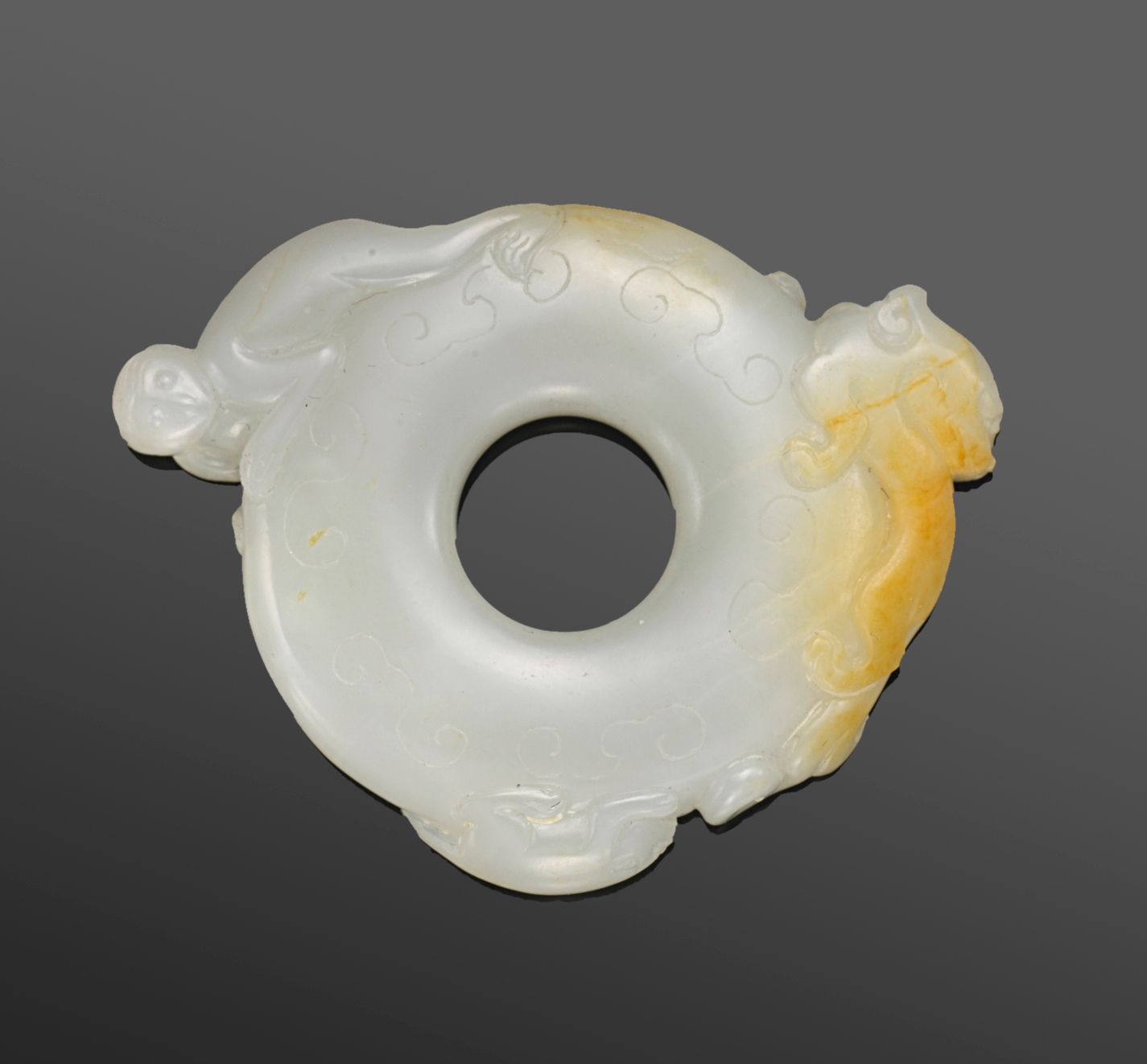 Bonhams : A white and russet jade bi-disk 18th/19th century