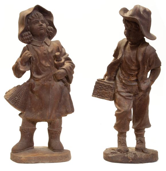 Bonhams Two cast iron garden figures of children