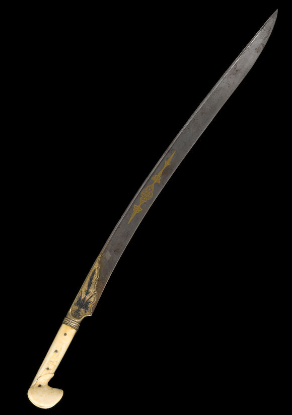 Bonhams : An Ottoman gold damascened and niello silver-mounted yataghan