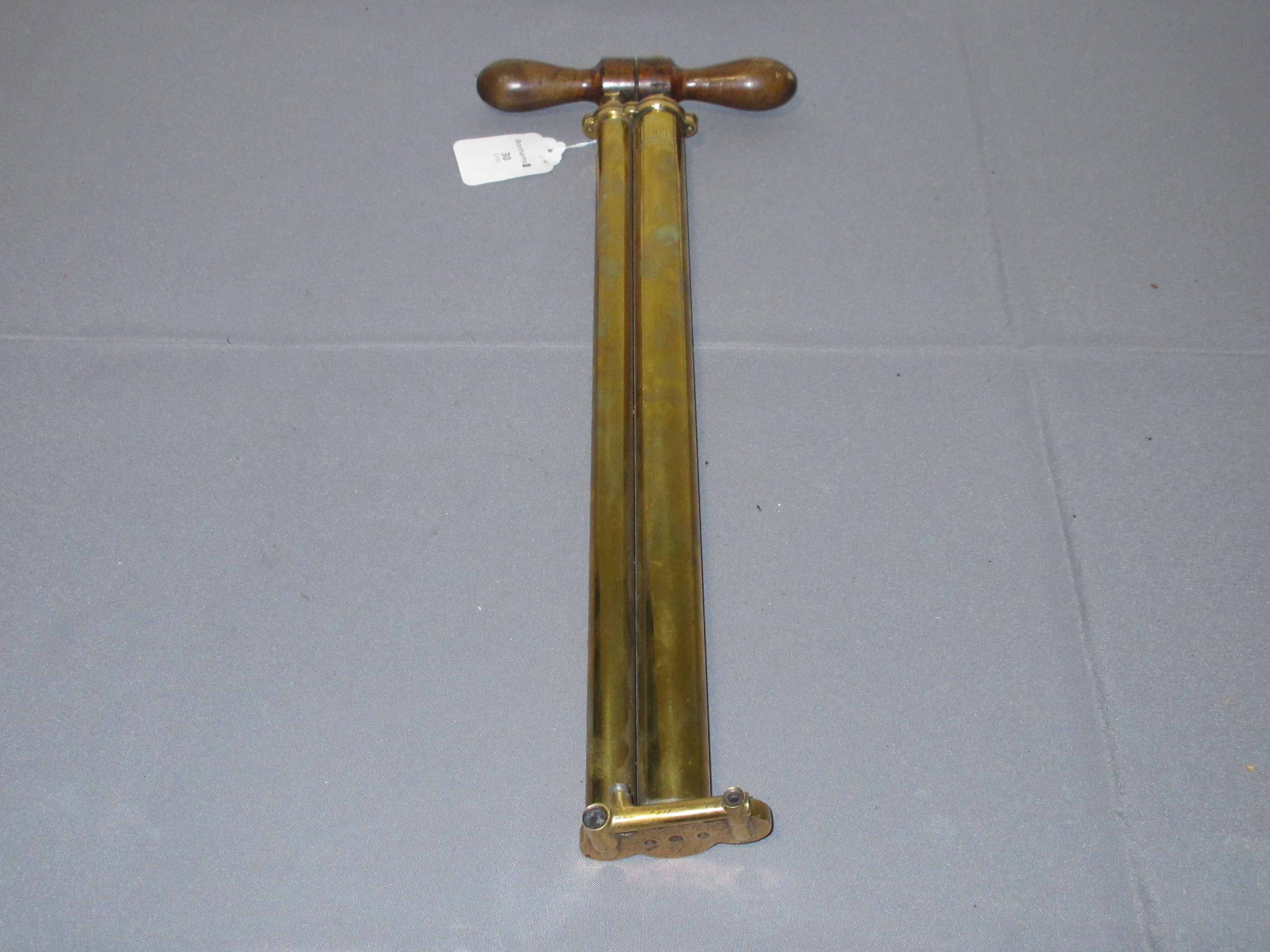 Bonhams Cars Property from the Collection of Joel Finn A brass foot pump