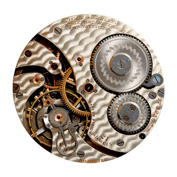 Bonhams Hamilton. A rare 14K gold open face contract watchFor Hayden