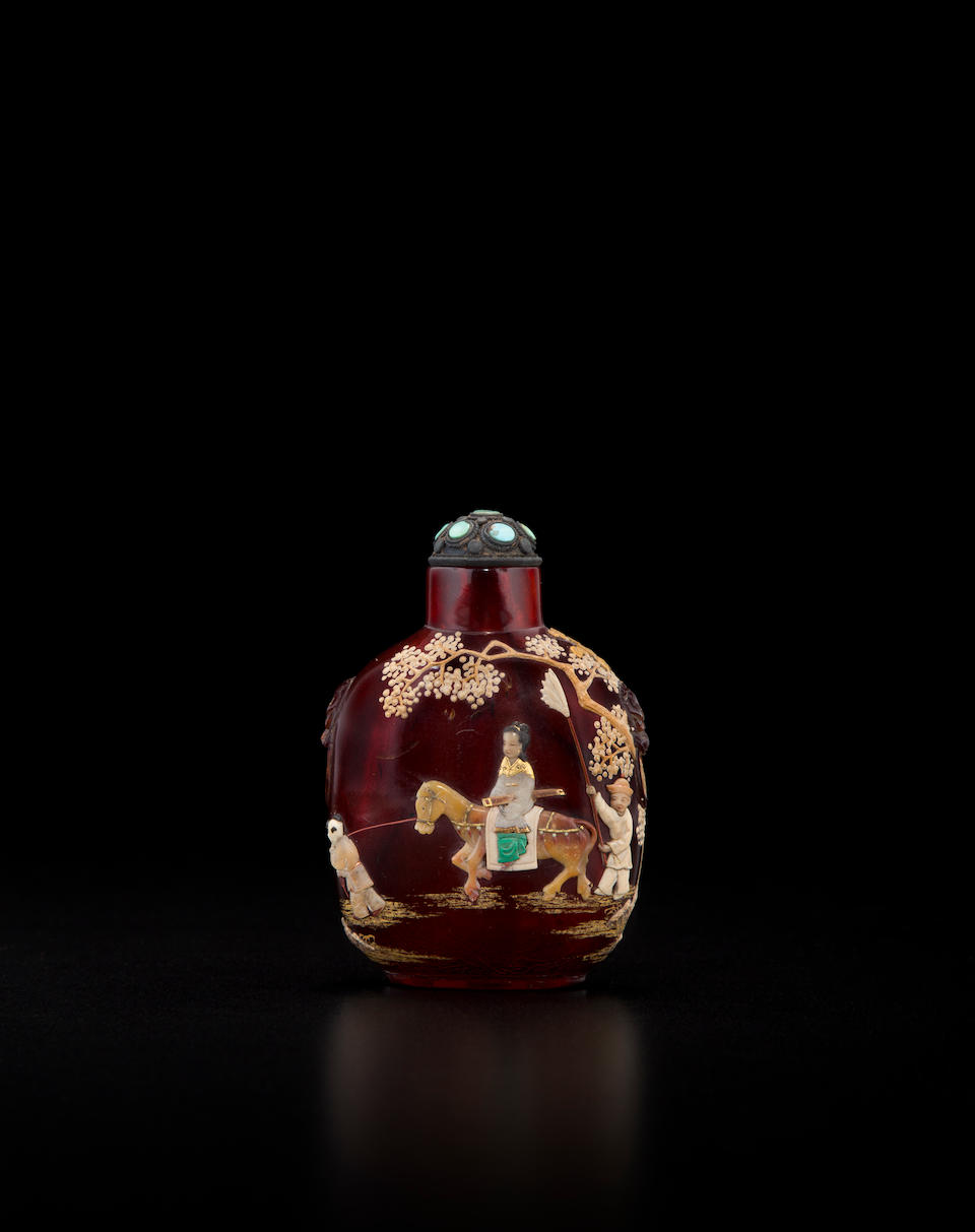 Bonhams : An embellished amber snuff bottle and a carved baltic amber ...