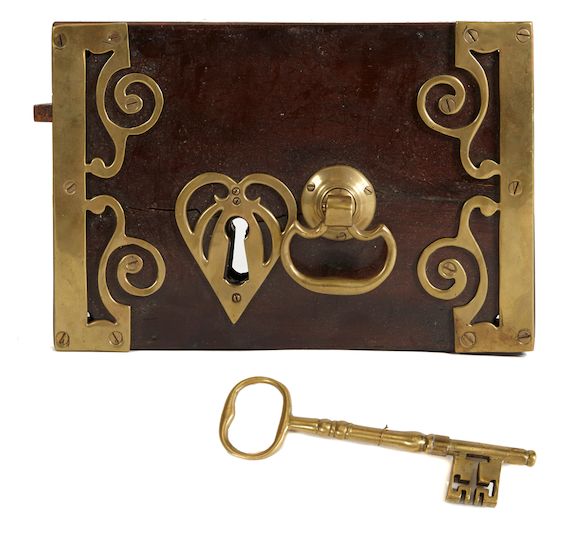 Bonhams : A large Irish brass and mahogany lock 19th century