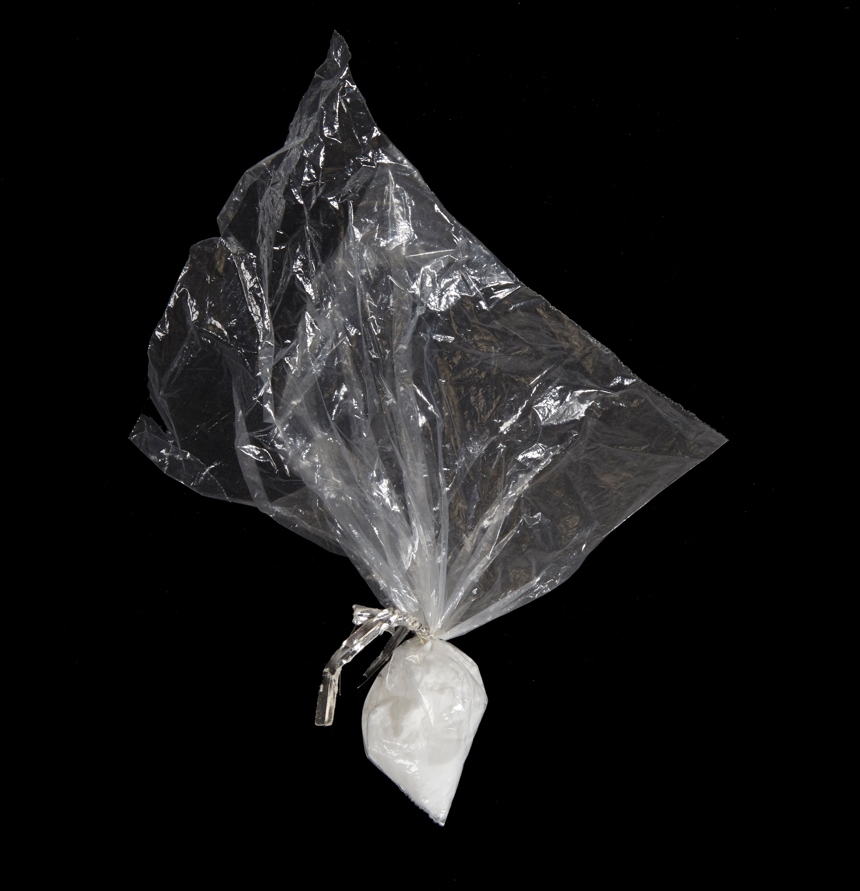 Bonhams An Uma Thurman credit card and prop bag of heroin from