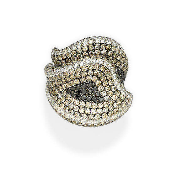 Bonhams : A colored diamond, diamond and 18k white gold ring