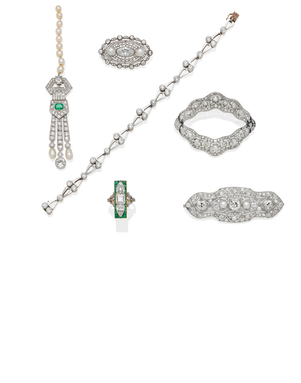 Bonhams : An Art Deco diamond, emerald and platinum-topped gold ring ...