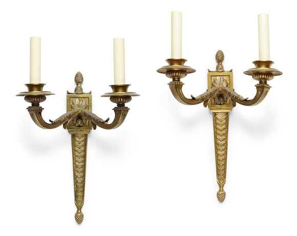 Bonhams : A pair of Louis XVI style gilt bronze two light bras de ...