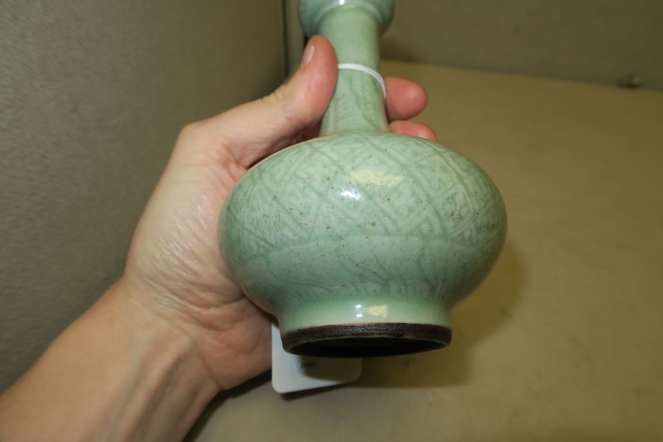 Bonhams A small celadon glazed garlichead vase 19th century