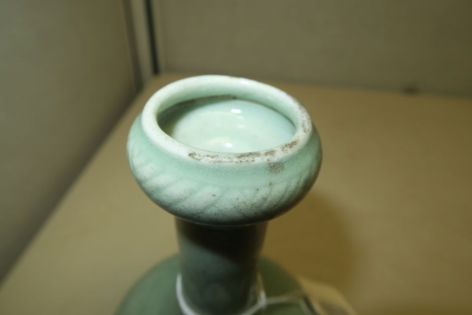 Bonhams A small celadon glazed garlichead vase 19th century