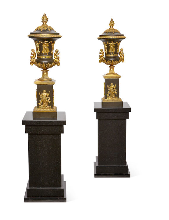 Bonhams : A pair of Empire style gilt and patinated bronze covered urns