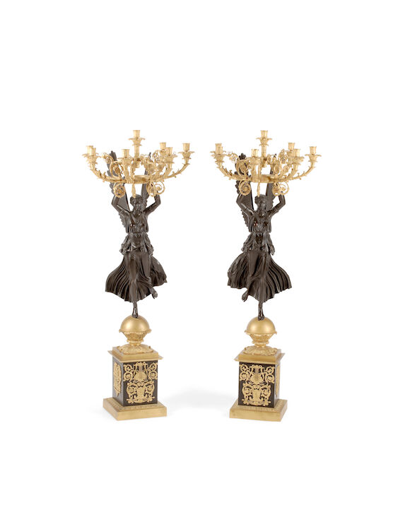 Bonhams : A Pair of Empire Style Patinated and Gilt Bronze Nike Form ...