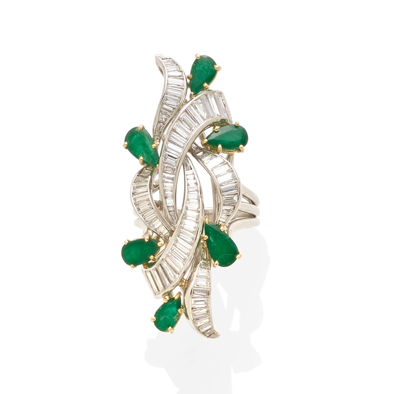 An emerald and diamond ring