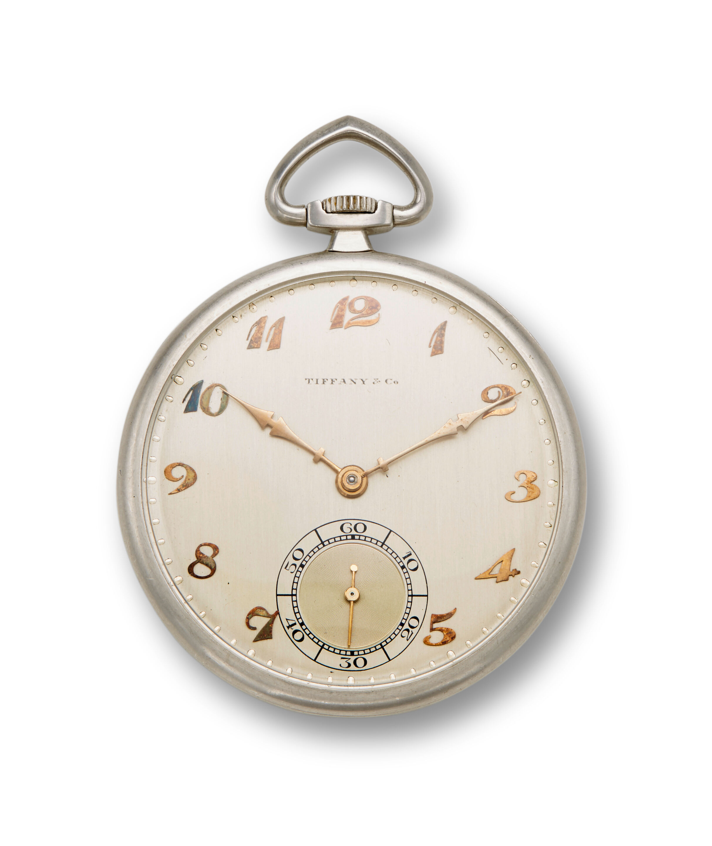 Tiffany & Co. A fine platinum open face dress watch and a platinum