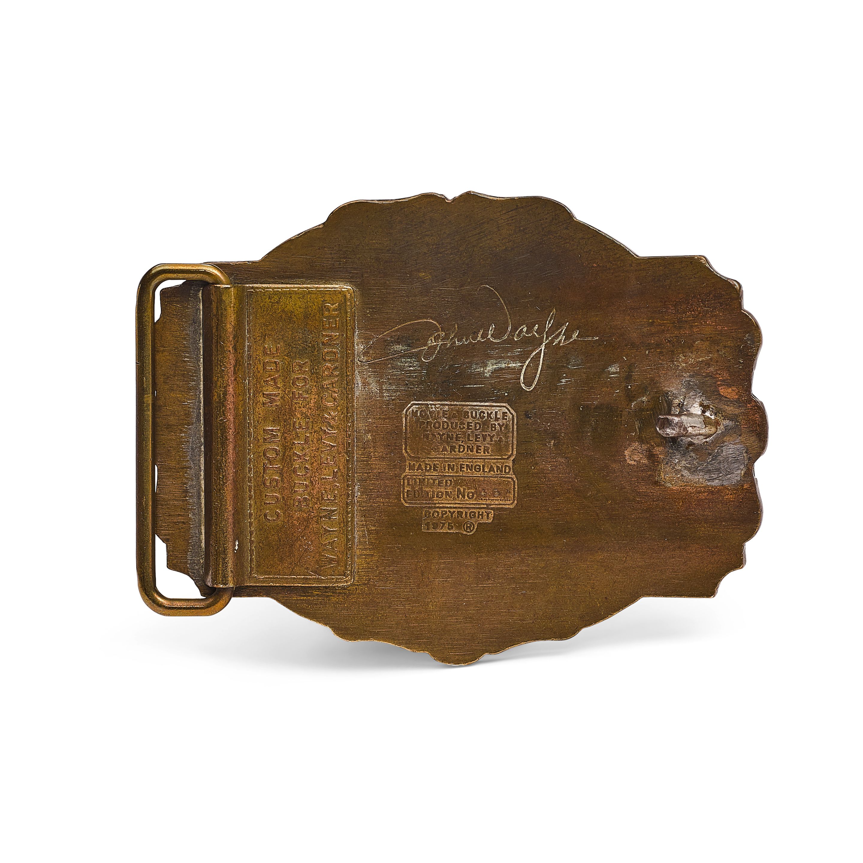 A John Wayne Brannigan belt buckle Bonhams