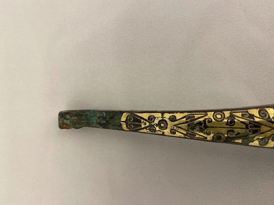 Bonhams : A gold inlaid bronze garment hook Han dynasty