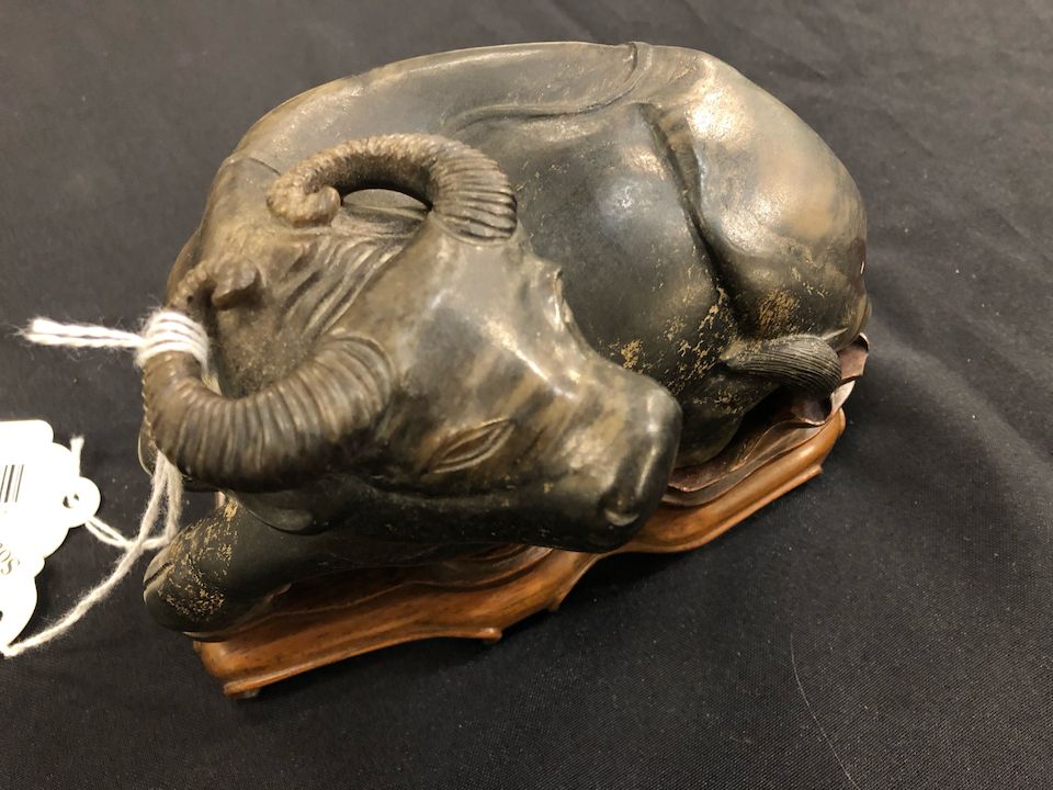 Bonhams A carved jade buffalo Qing dynasty