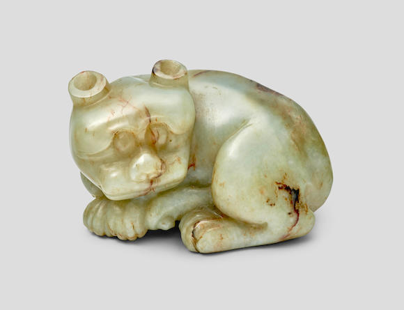 Bonhams : A celadon and russet jade carving of a mythical beast 19th ...