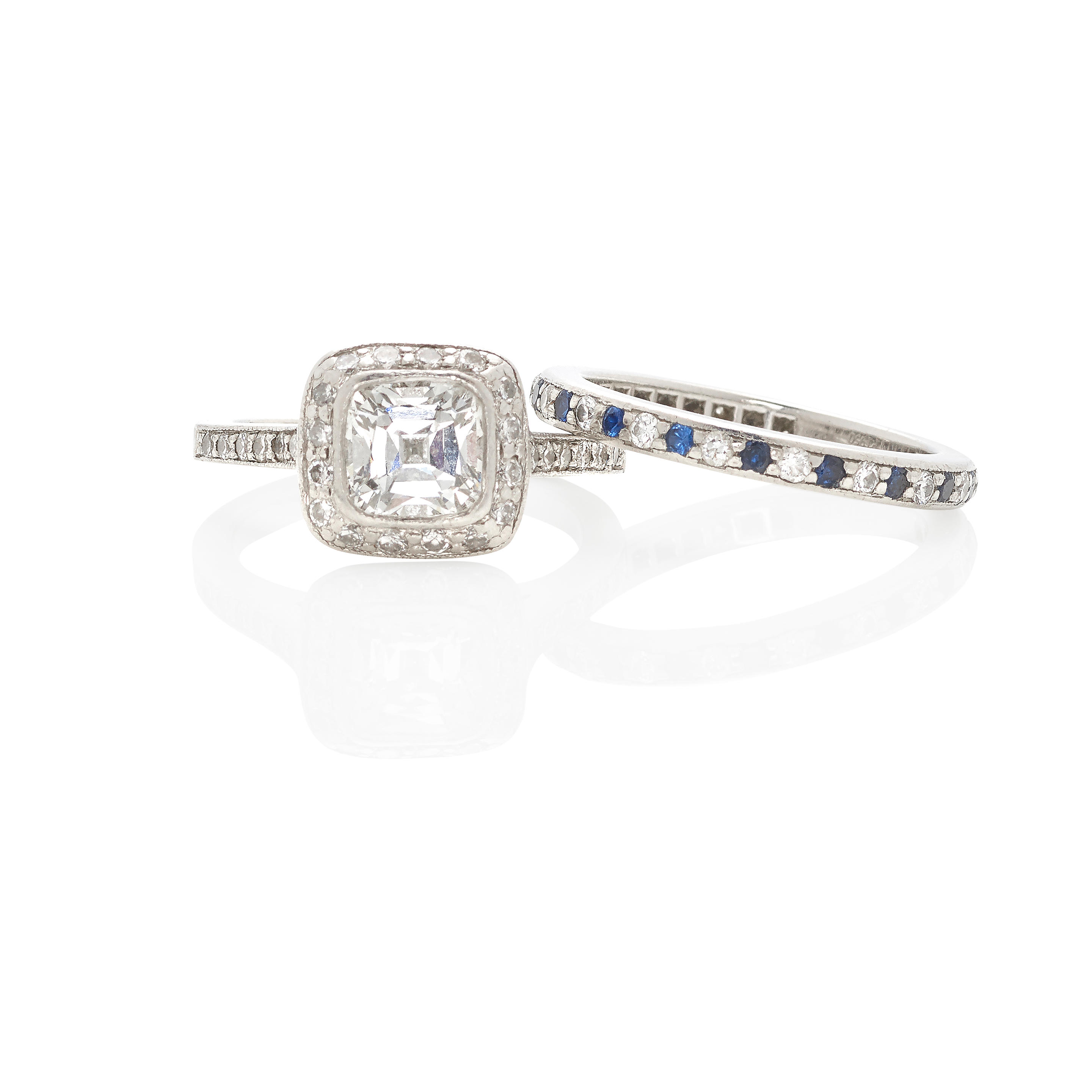 TIFFANY & CO.: PLATINUM AND DIAMOND RING TOGETHER WITH A DIAMOND AND...