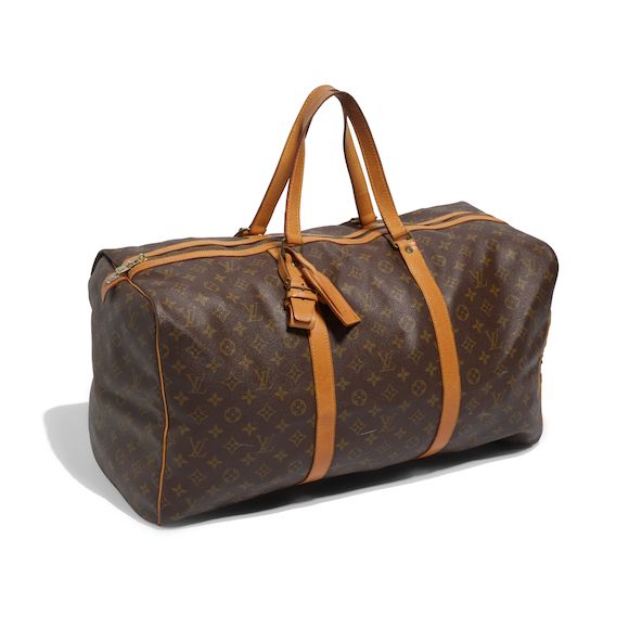 Bonhams A LOUIS VUITTON MONOGRAMMED CANVAS TRAVEL BAG