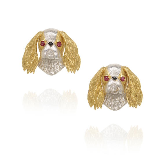 Bonhams : A PAIR OF 14K BI-COLOR GOLD AND RUBY DOG EARRINGS