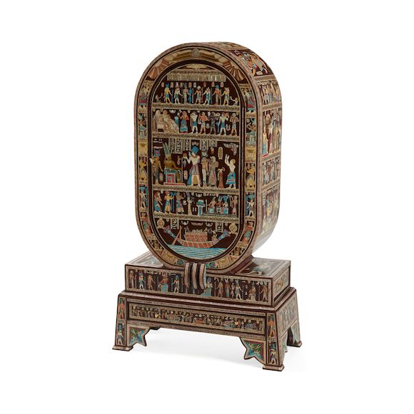 Bonhams AN EGYPTIAN STYLE INLAID WOOD ON STAND