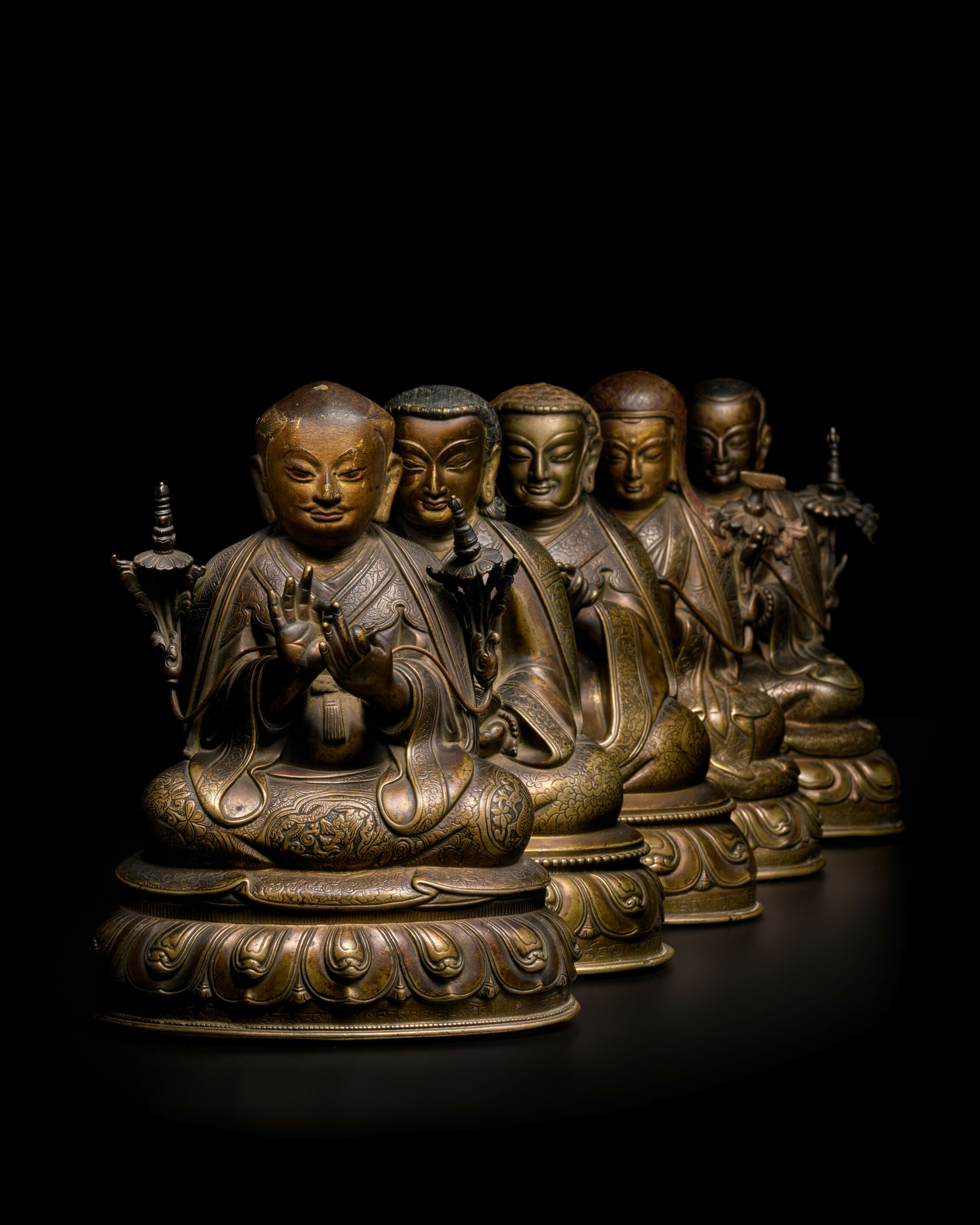 Bonhams A SET OF COPPER ALLOY PORTRAITS DEPICTING THE FIVE PATRIARCHS