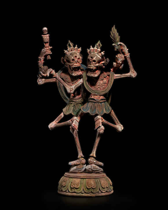 Bonhams : A POLYCHROMED WOOD FIGURE OF CHITIPATI TIBET, 19TH CENTURY