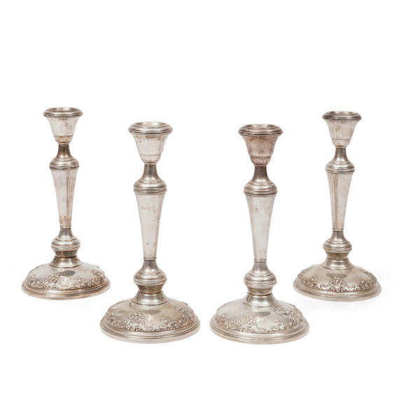 Bonhams Skinner : Four Wallace Weighted Sterling Silver Candlesticks