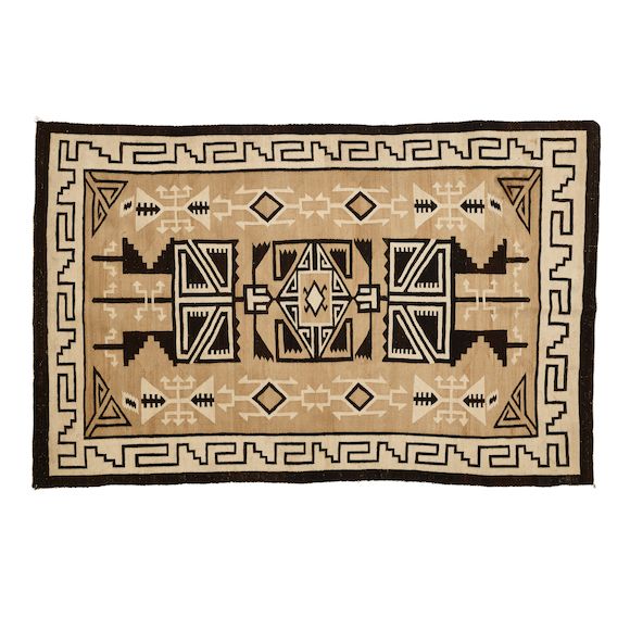 Bonhams A Diné (Navajo) Two Grey Hills rug, attributed to Mary