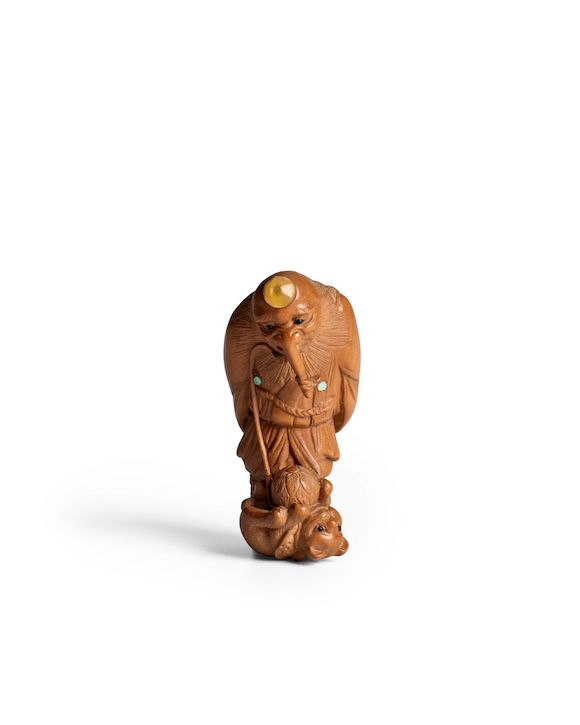 Bonhams : A WOOD NETSUKE OF HANATAKA TENGU AND A CAT Edo period (1615 ...