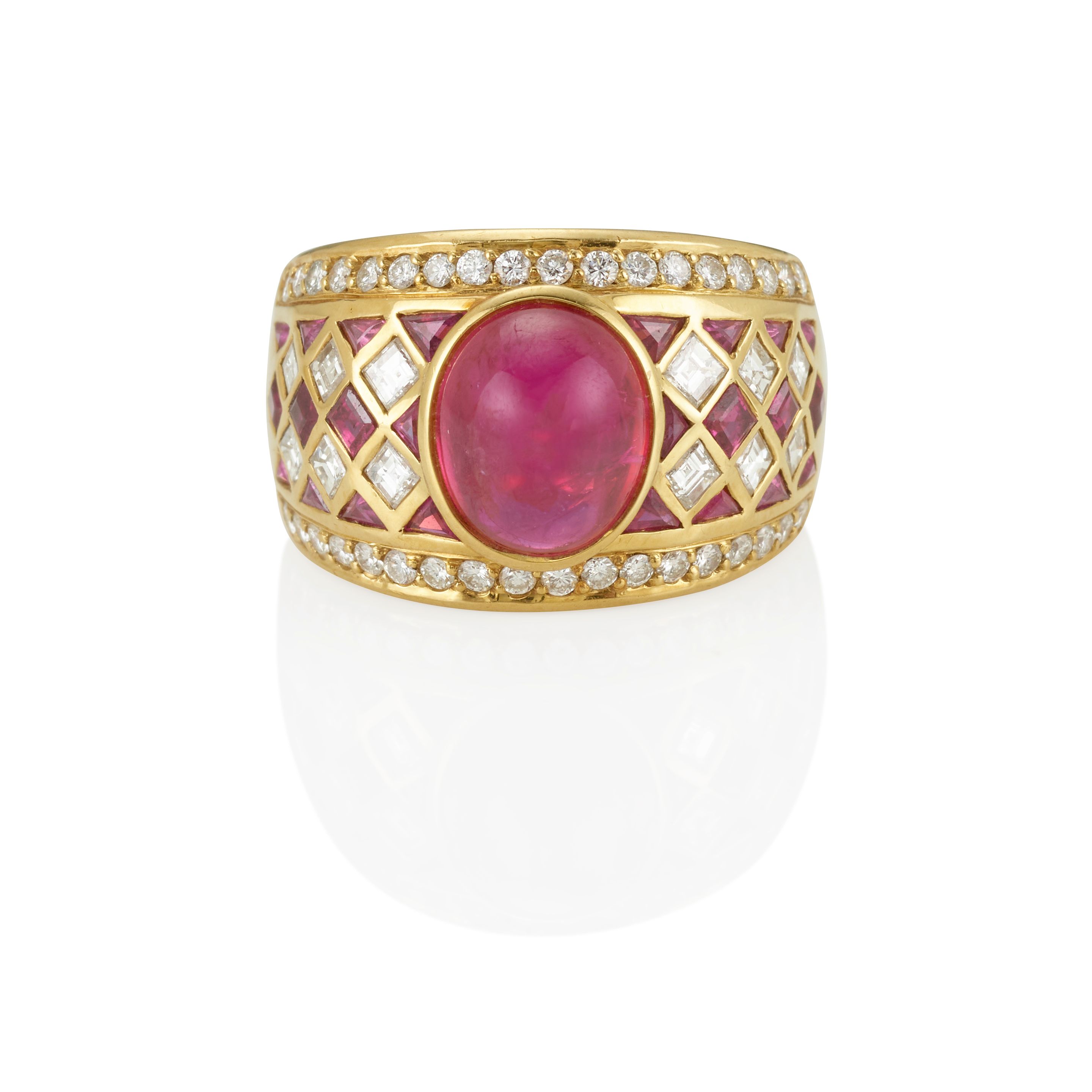 AN 18K GOLD, RUBY AND DIAMOND RING