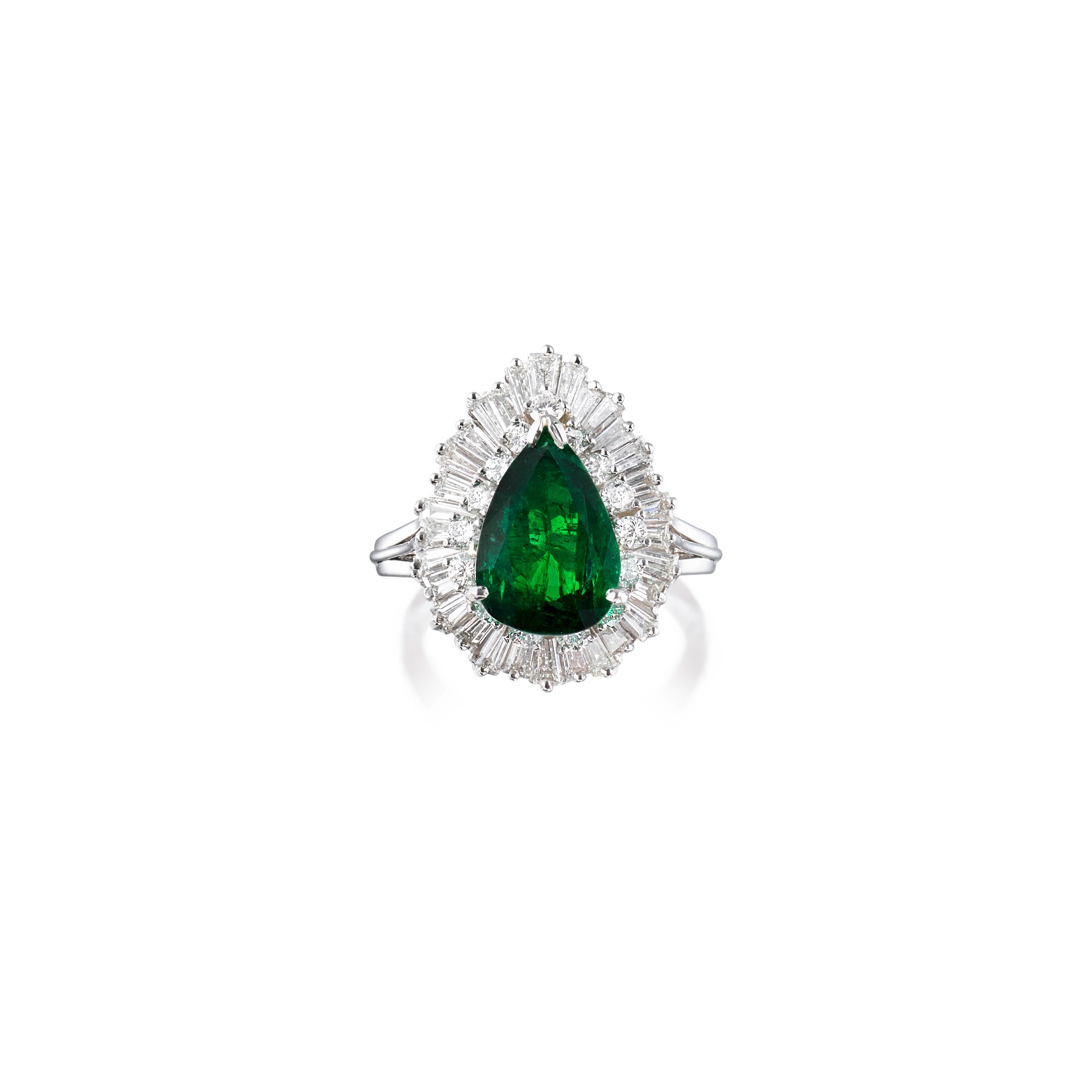AN EMERALD AND DIAMOND RING