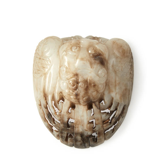 Bonhams Skinner : AN ARCHAIC GRAY JADE CARVING