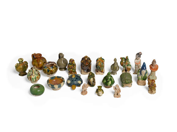 Bonhams : A GROUP OF TWENTY-THREE EARLY CERAMIC MINIATURES Han to Tang ...