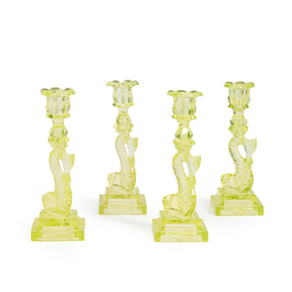 Bonhams Skinner Four Yellow Pressed Glass Dolphin Candlesticks Boston And Sandwich Glass Co 3175