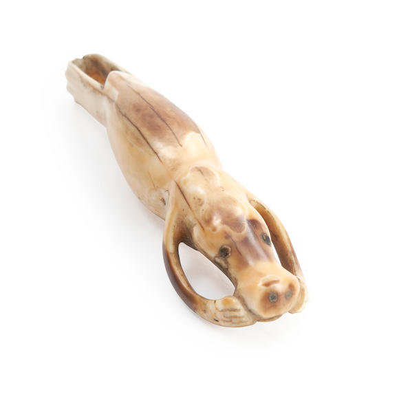 Bonhams Skinner : An Eskimo seal carving lg. 5 1/8 in.