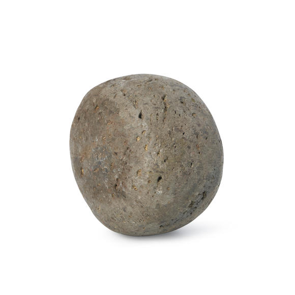 Bonhams Skinner : A Hawiian game stone ulu maika wd. 3, ht. 2 1/8 in.