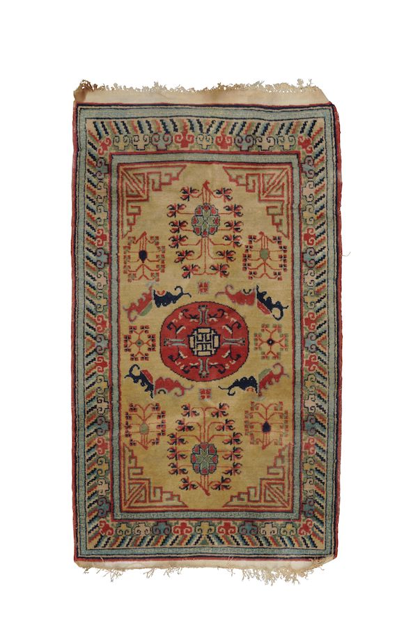 Bonhams : THREE CHINESE RUGS; ONE A BAOTOU/INNER MONGOLIAN 'EIGHT ...